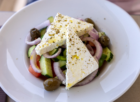 Greek salad with feta cheese. Typical delicious greek style lunch