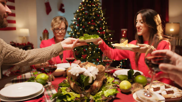 istock Family sharing meal on thanksgiving 1758330124