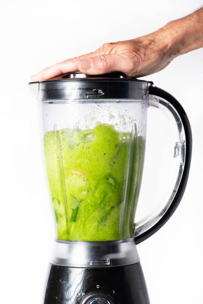 istock Preparation of green smoothie 1758331249