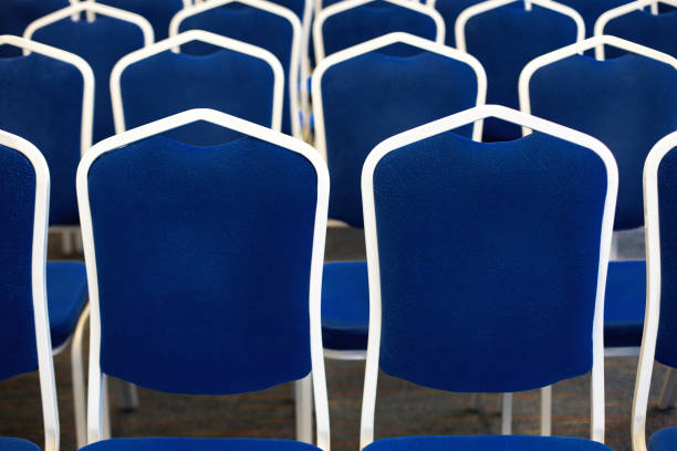 Blue chairs in the meeting room.