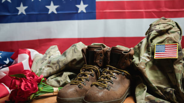 istock Boots hat and USA flag close up for Veterans Day 1758335005