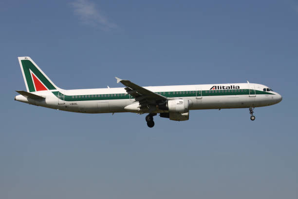 Schiphol, Netherlands - August 26, 2013: Italian Alitalia Airbus A321-100 with registration I-BIXL on short final for Amsterdam Airport Schiphol.