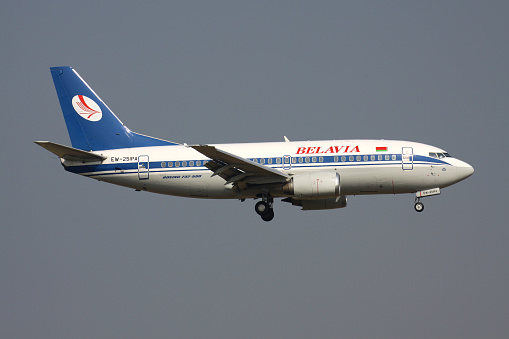 Schiphol, Netherlands - August 23, 2013: Belarusian Belavia Boeing 737-500 with registration EW-251PA on short final for Amsterdam Airport Schiphol.