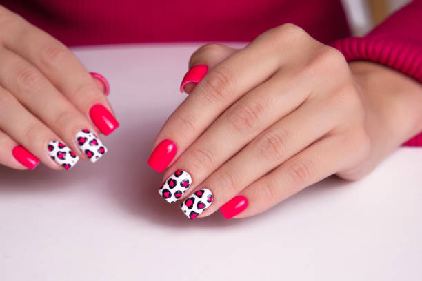 istock Female hands with pink manicure nails 1758348793