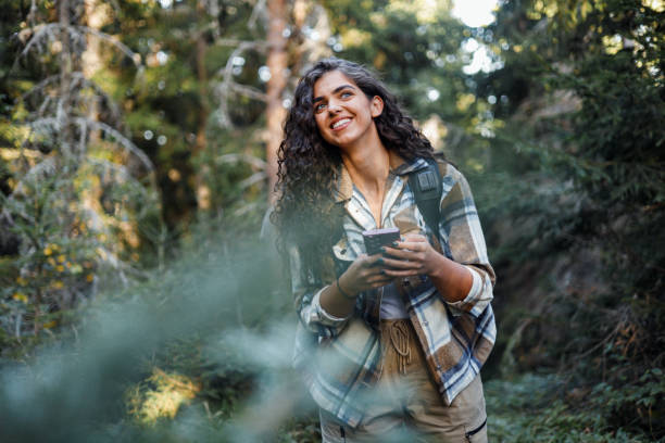istock Mobile phone in hand on mountain hike 1758364815