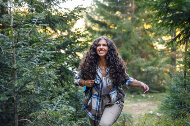 istock Backpacking woman exudes joy in mountains 1758364862