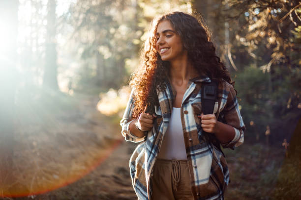 istock Young hiker with backpack relishes mountain walk 1758365860