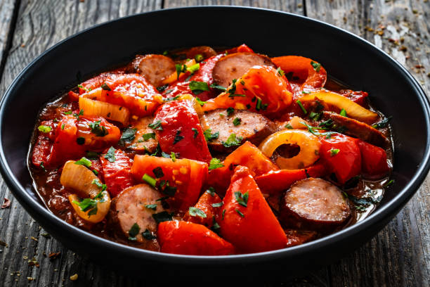 istock Hungarian stew - vegetables with sausages on wooden table 1758372856
