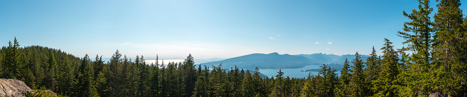 Beautiful panoramic view of the ocean and islands from the top of Mount Gardner, Bowen Island, British Columbia, Canada. Mt. Gardner is the highest point on Bowen Island.