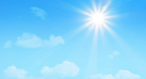 istock Bright sun with beautiful beams on a blue sky 1758422394