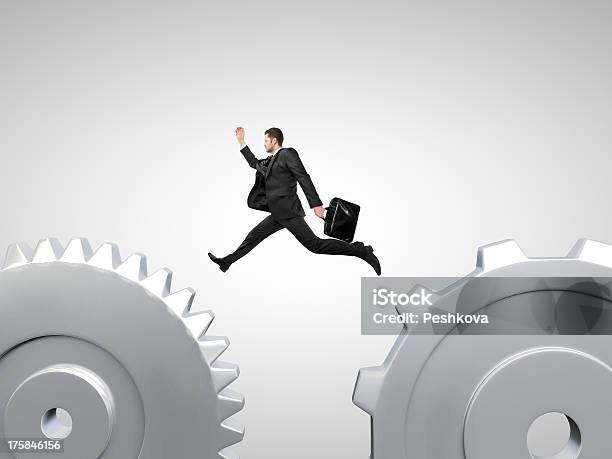 Businessman Jumping Stock Photo - Download Image Now - Adult, Blue-collar Worker, Briefcase