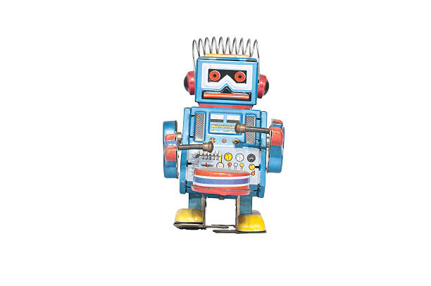 retro tin robot toy isolated stock photo
