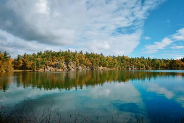istock Pink Lake, Gatineau, Quebec, Canada during fall season with colorful tree 1758496166