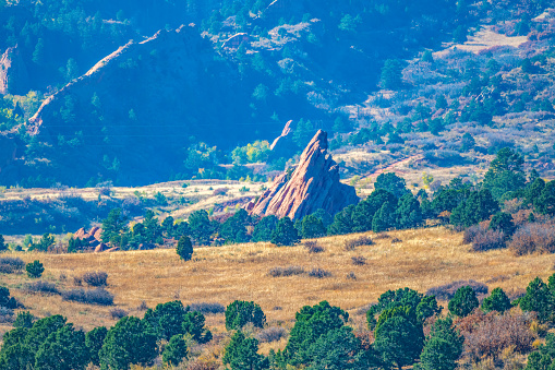 Massive sandstone formation of red rock near the Garden of the Gods and the Pikes Peak forest in Colorado Springs of western USA in North America.