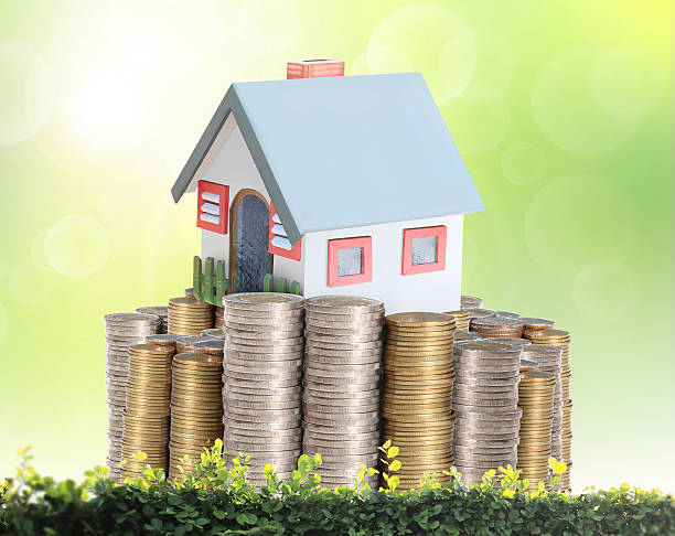 istock concept by money house from coins 175853664