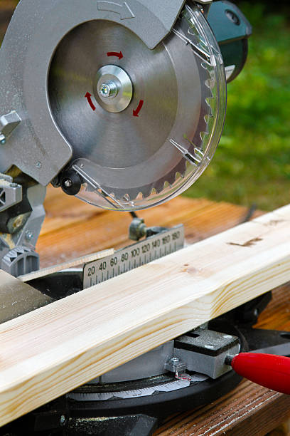 istock circular saw and wood plank 175856268