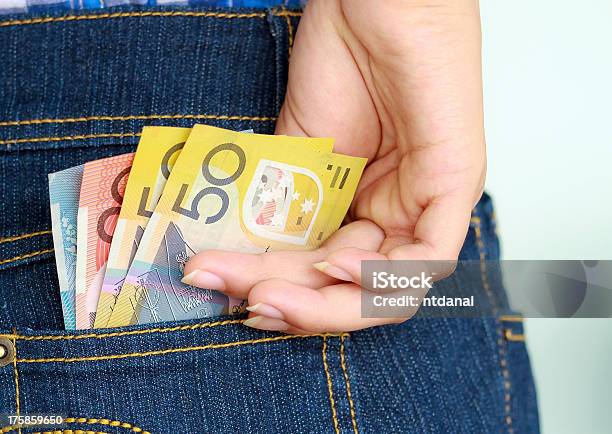 Closeup Of Hand Taking Multicolored Banknotes Out Of Pocket Stock Photo - Download Image Now