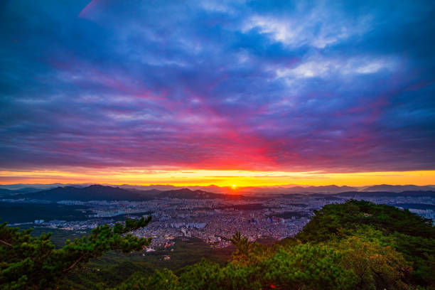 istock Mountains, buildings, trees and sky 1758609194