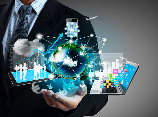 Man with technology icons floating above his hand