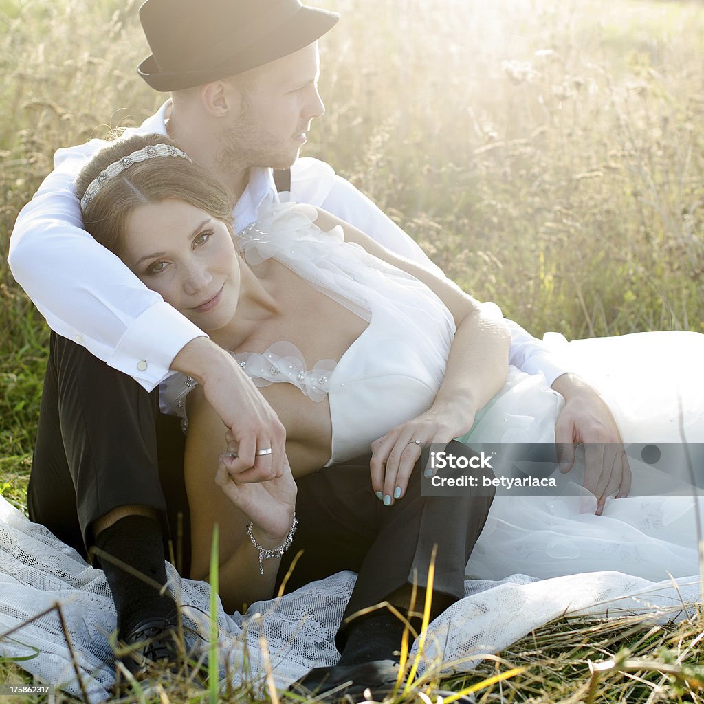 Bride and groom posing outdoor Vintage wedding Couple - Relationship Stock Photo