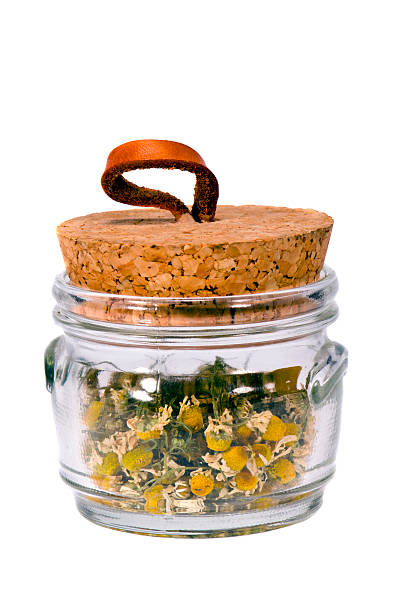 istock isolated camomile tea in the glass pot 175862514