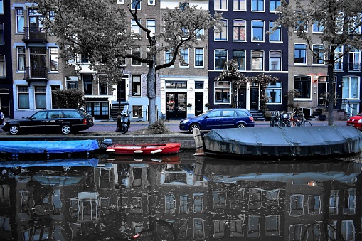 A color blocked view of Amsterdams famous canals, streets, and beautiful architecture