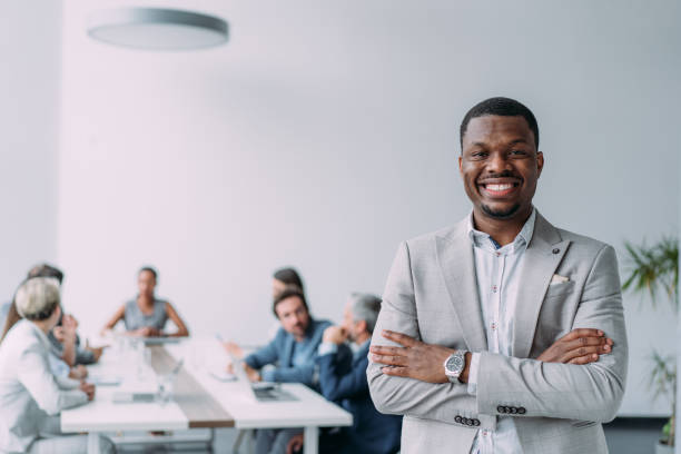 istock Confident businessman and his team. 1758688732