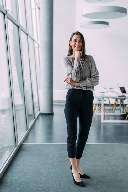 Confident businesswoman in modern office.