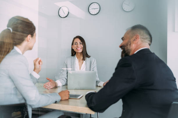 istock Group of business persons talking in the office. 1758688778