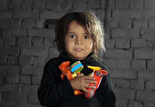 istock Happy Child Holding Toys 175868975