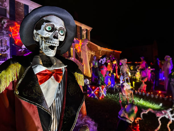 istock Skeleton ringmaster is featured in multi-colored lit Halloween yard 1758731703