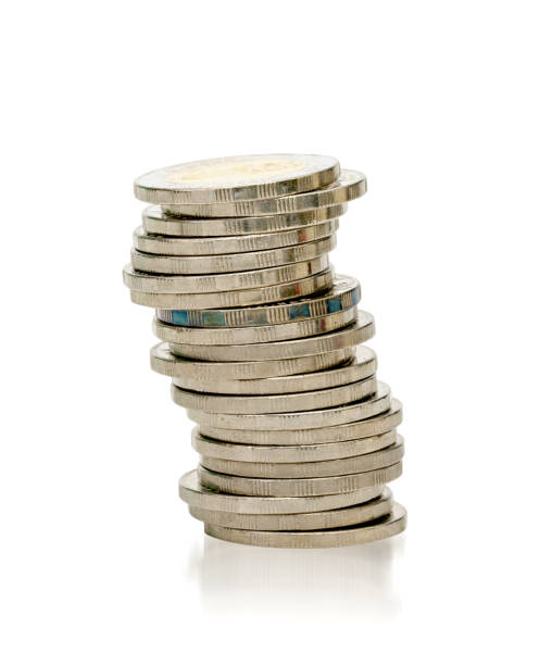 istock closeup silver coins stacks isolated on white background 1758858493