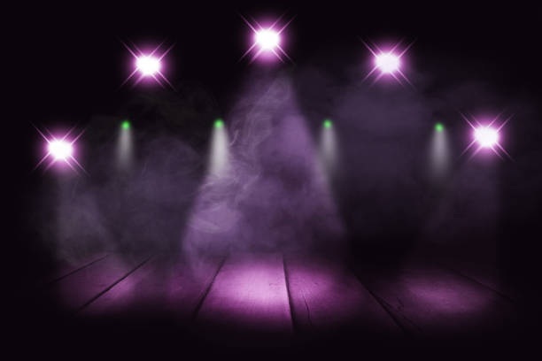 istock Pink lighting and smoke on stage with floor wood 1758861544