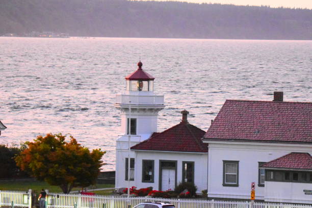 The Mukilteo Lighthouse was opened 1906 with a revolving Fresnel lens.  The station consisted of a 38-foot tower, fog signal, 2 keeper cottages and a windmill for the towns water supply.  All of these still exist today except the windmill.  This lighthouse today is still used for navigational assistance.