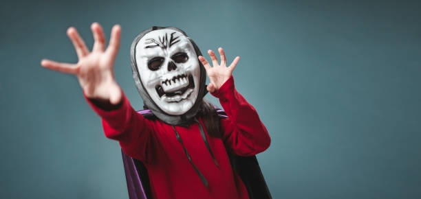 istock A little girl is wearing a devil costume for Halloween. 1758991789