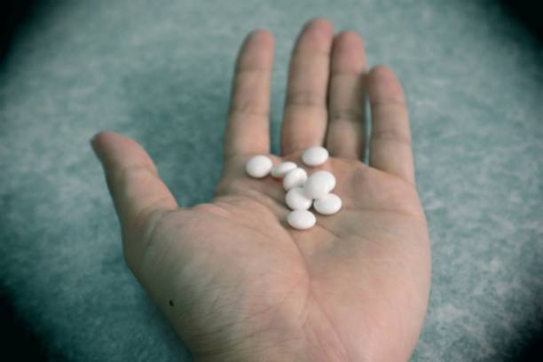 istock Close-up of medicine on hands 1758992160