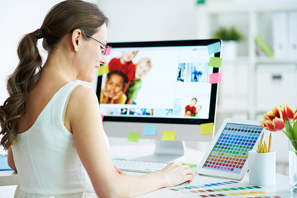 istock Graphic designer at her work desk with tablet and computer 175899560