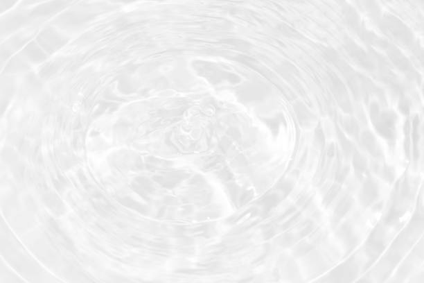 istock Defocus blurred transparent blue colored clear calm water surface texture with splashes reflection. Trendy abstract nature background. Water waves in sunlight with copy space. Blue watercolor shine. 1759014380