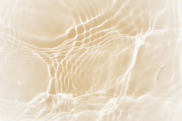 istock Defocus blurred transparent white colored clear calm water surface texture with splashes reflection. Trendy abstract nature background. Water waves in sunlight with copy space. Blue watercolor shine. 1759014381