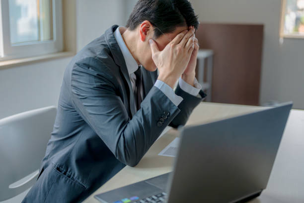 istock Business man bothering headache 1759020003