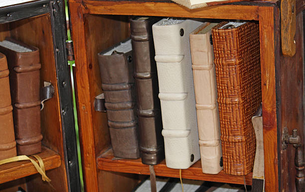 istock ancient leather-bound books in a antique shop 175902003