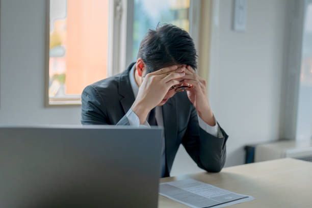 istock Business man bothering headache 1759022783