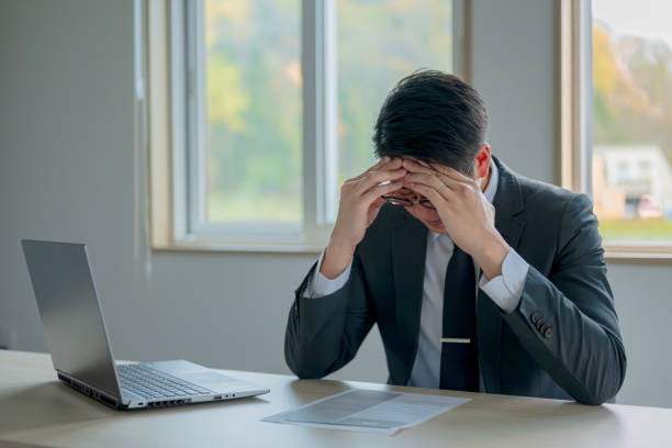 istock Business man bothering headache 1759024385