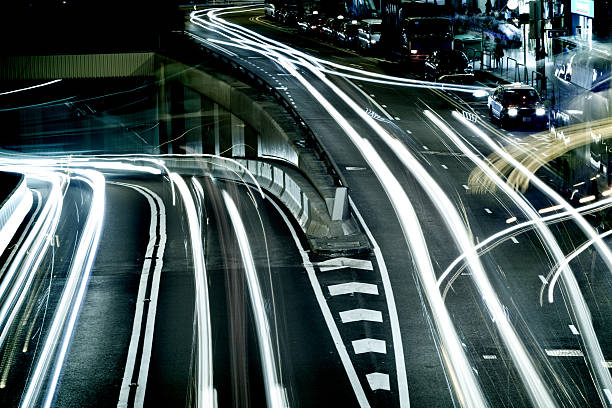istock moving car with blur light through city at night 175902905