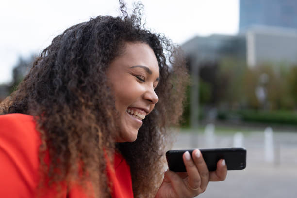 istock Black woman sending voicemail on phone 1759059804