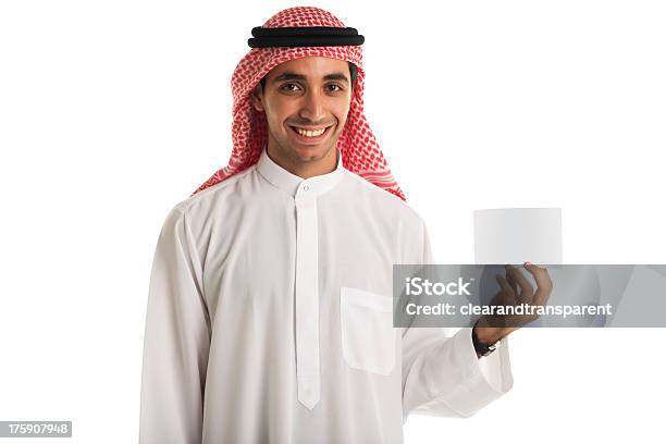 Foto de Feliz Homem Segurando Nota Árabe e mais fotos de stock de Adulto - Adulto, Adulto maduro, Arabesco - Estilo