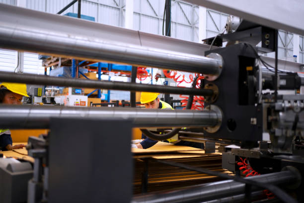 istock Blue collar worker and cardboard package factory. 1759093865