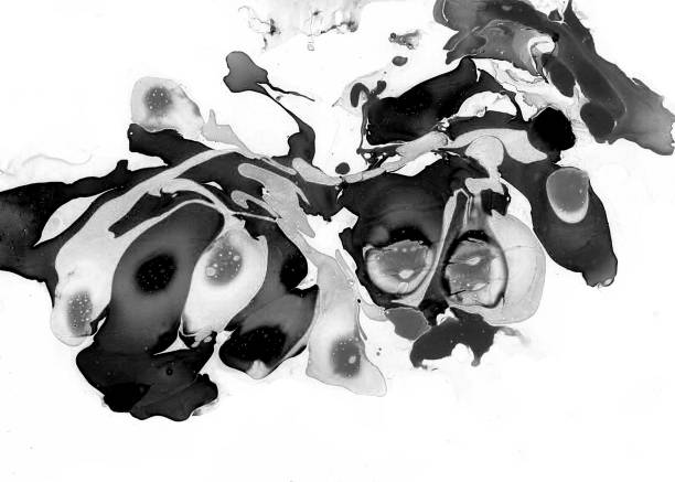istock Abstract monochrome background of chaotic spots of different shapes and sizes on white. 1759101720