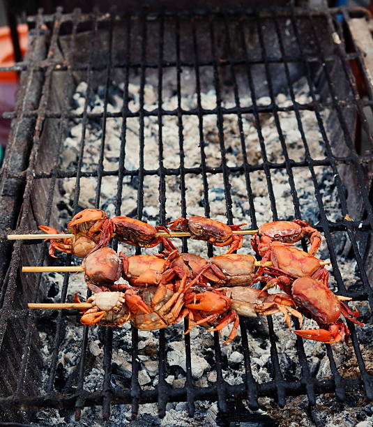 istock crabs with wood plug on the grill. 175910261