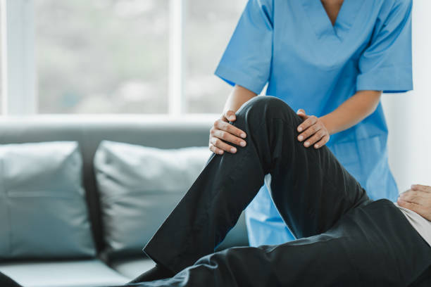 istock osteoarthritis physical therapist Therapy and help patient exercise and treat young athlete's injured knee. Wound rehabilitation, physical therapy, recovery concept 1759117579